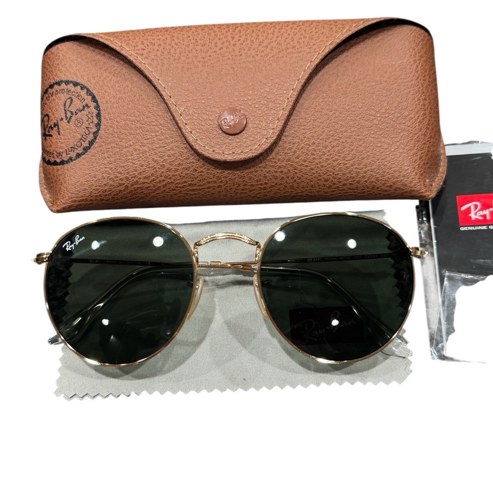 Ray-Ban RB3447 Round Metal sunglasses with a gold metal